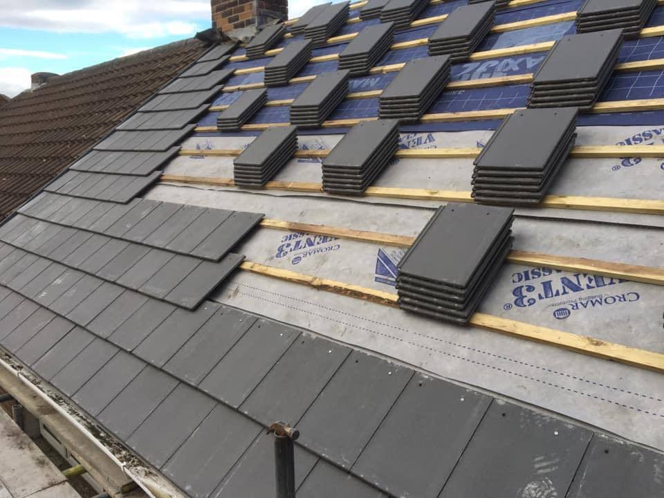 New roof being installed in Bradford with slate tiles and breathable membrane